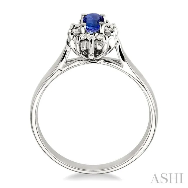 5x3mm Oval Cut Tanzanite and 1/10 Ctw Round Cut Diamond Ring in 10K White Gold